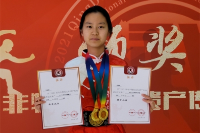 Li Shuhan won the first prize of "2021 Qingdao intangible cultural heritage traditional Wushu exchange competition"